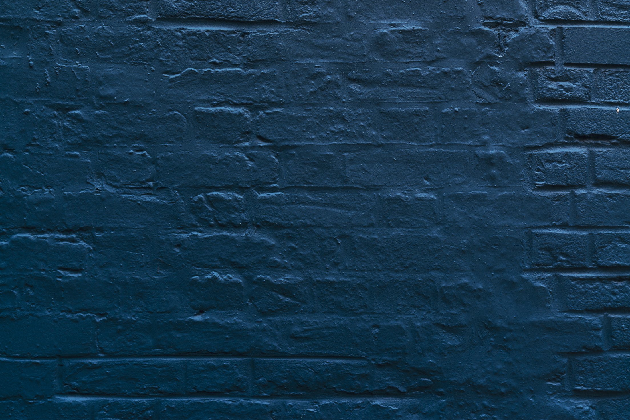 Navy blue brick wall background